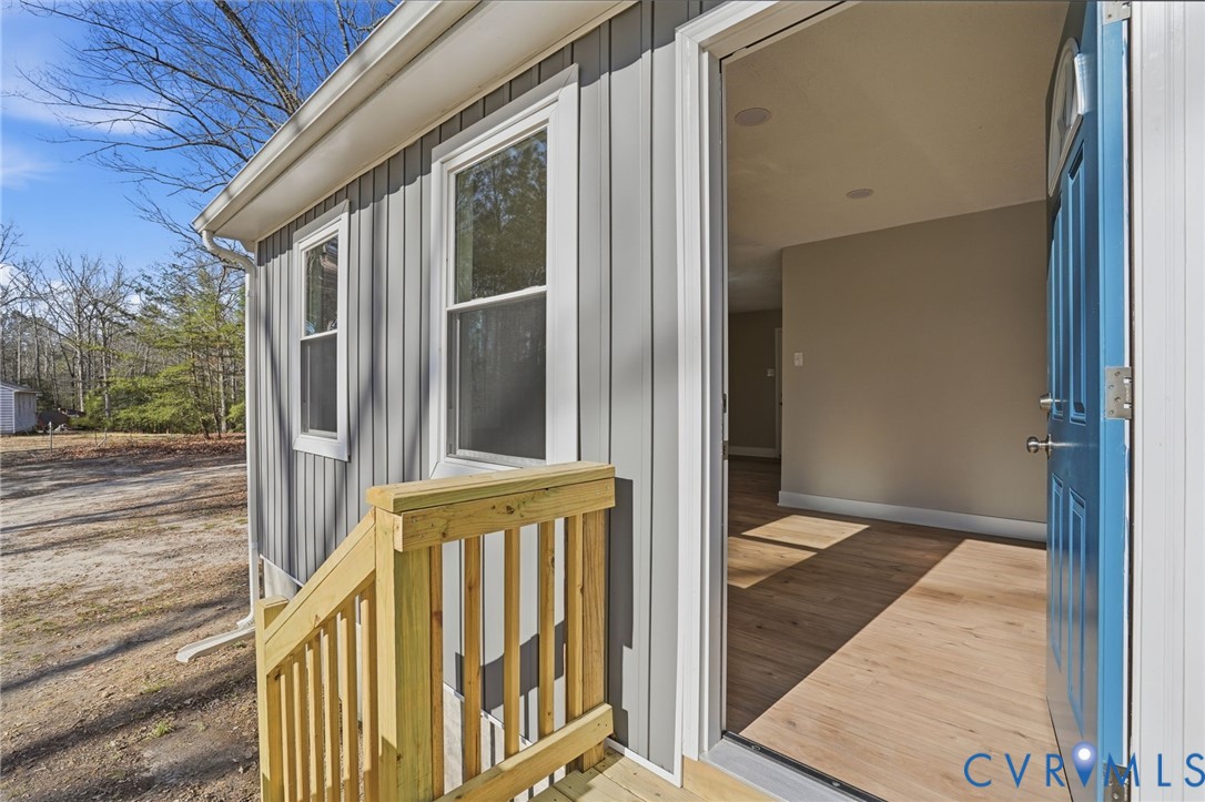286 Mill Pond Road South St. Stephens Church, VA 23148 - Photo 25 of 39 a view of a balcony with wooden floor