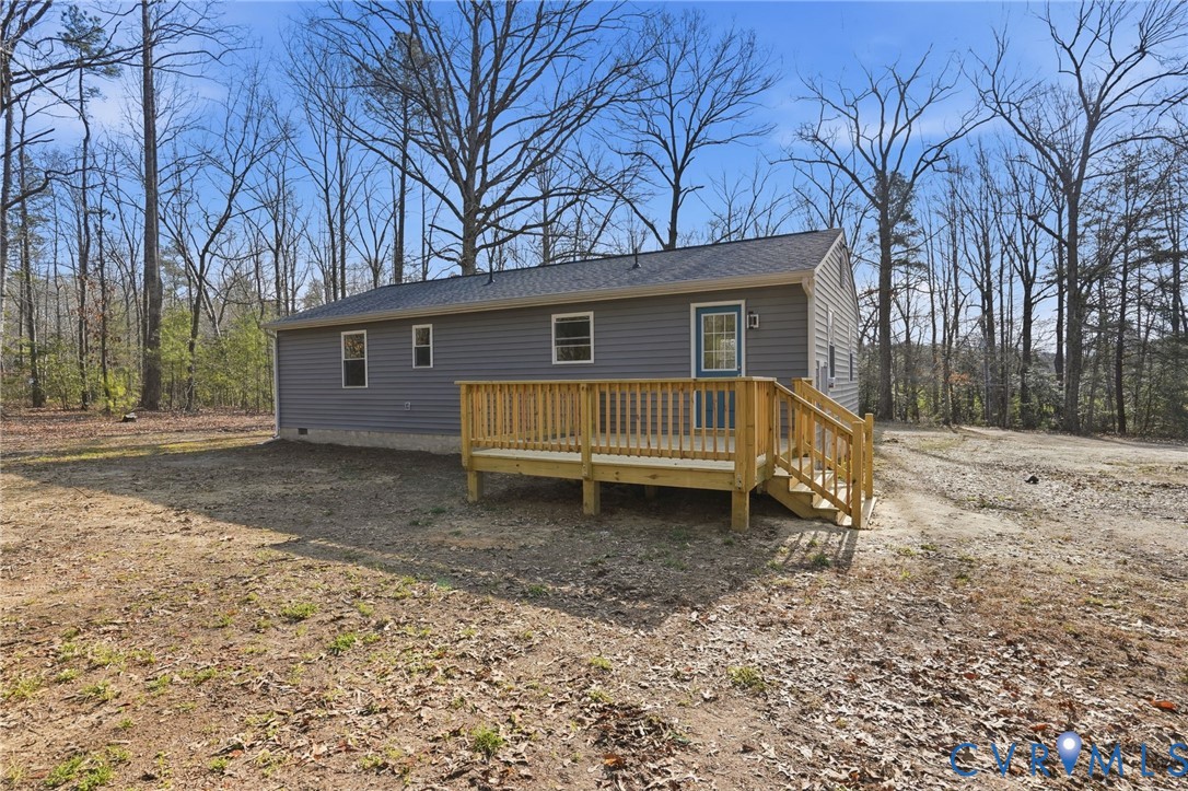 286 Mill Pond Road South St. Stephens Church, VA 23148 - Photo 32 of 39 a house with trees in the background
