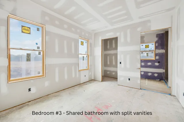 a view of a bathroom with a glass door