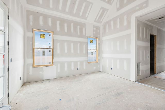 a black and white photo of a living room