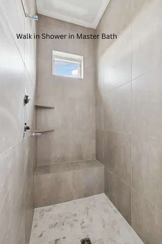 a view of a house with a wooden deck