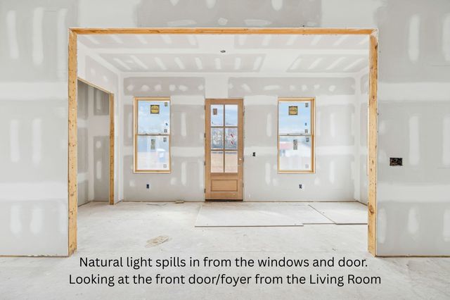 an aerial view of a house with outdoor space and lake view