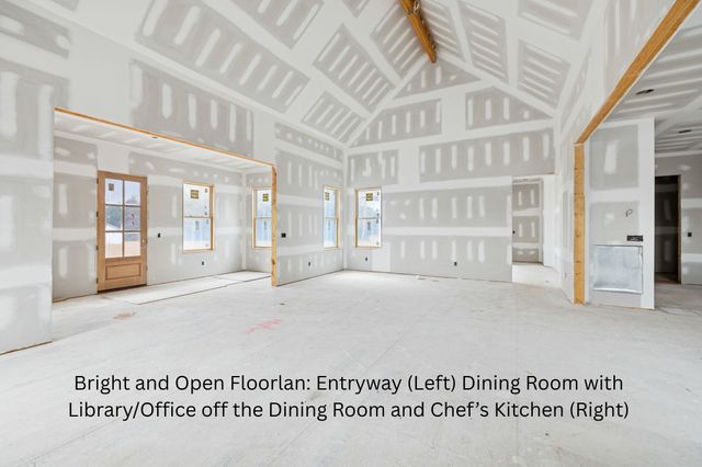 a view of a lake with houses in the back