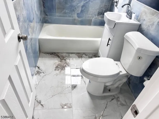 a very nice looking refrigerator in a kitchen with a refrigerator and a window