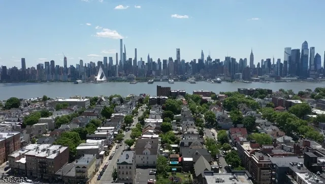 a view of a dining room with furniture and window