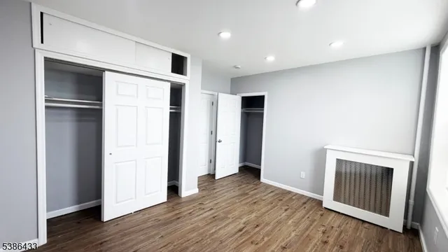 a view of a big room with wooden floor