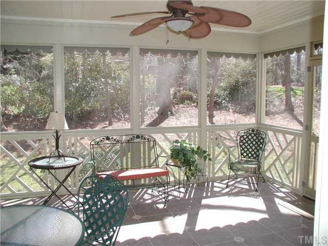 10721 Dunhill Terrace Raleigh, NC 27615 - Photo 16 of 19 16'x14' Screened-in Porch with new screens and tiled flooring. Screened Porch