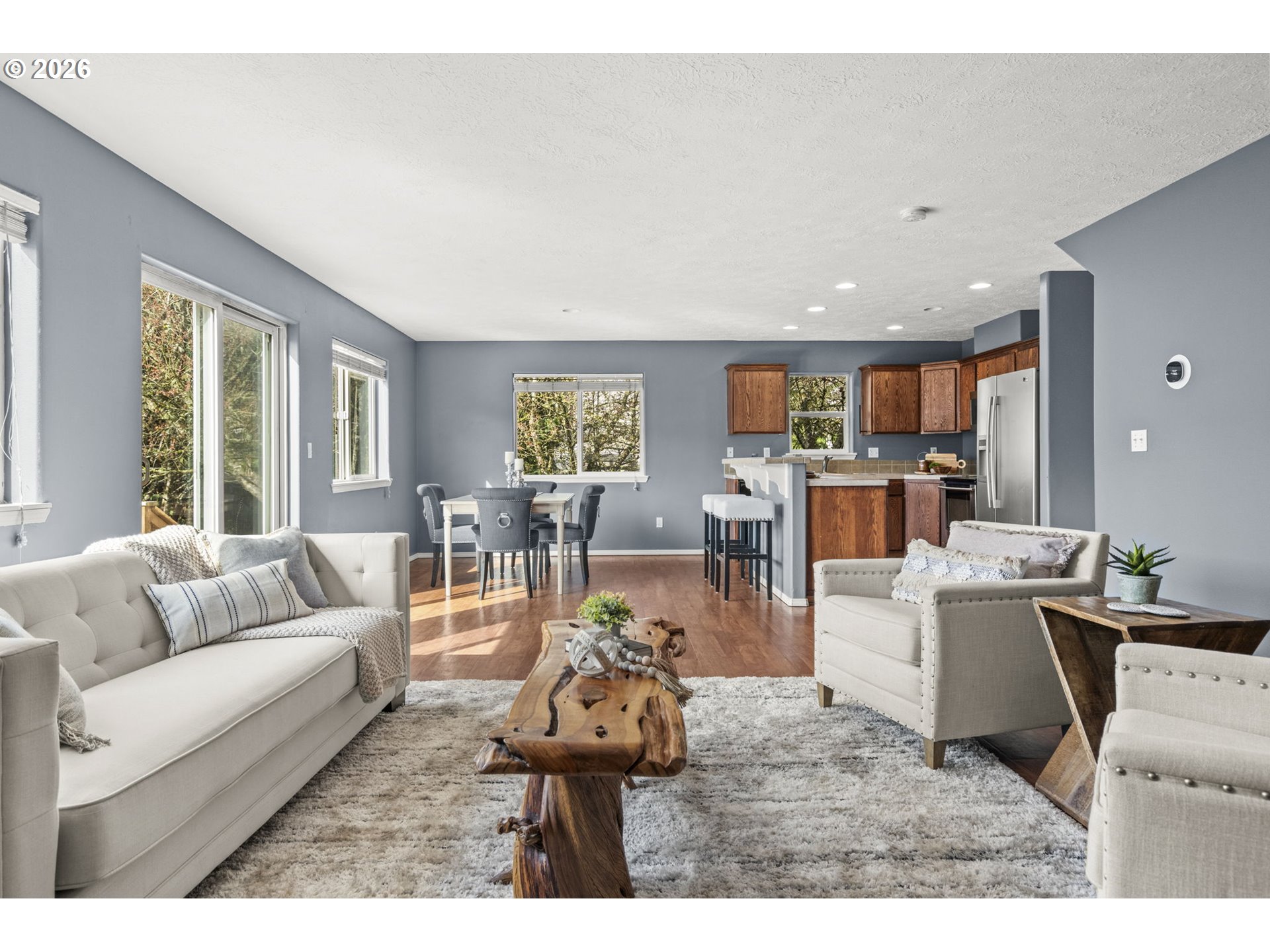 38882 Haskins Street Sandy, OR 97055 - Photo 11 of 46 a living room with furniture and a large window