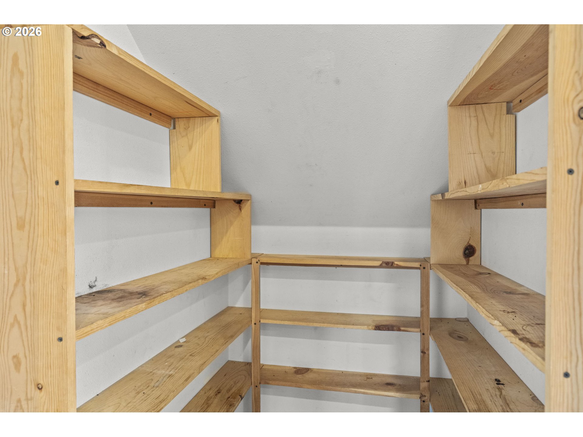 38882 Haskins Street Sandy, OR 97055 - Photo 21 of 46 a view of walk in closet with empty racks