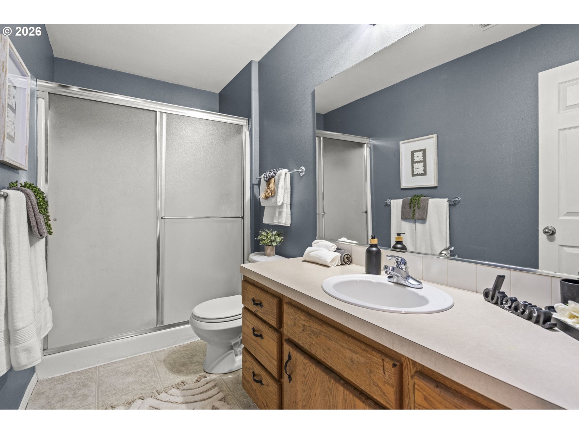 38882 Haskins Street Sandy, OR 97055 - Photo 27 of 46 a bathroom with a sink toilet and shower
