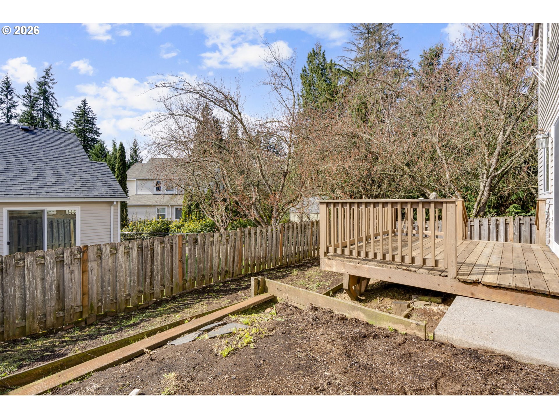 38882 Haskins Street Sandy, OR 97055 - Photo 41 of 46 a view of a house with wooden fence