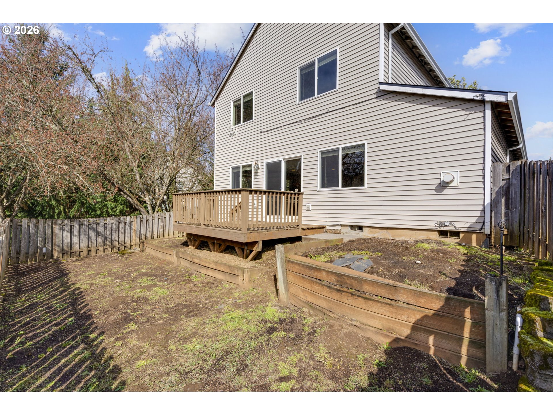 38882 Haskins Street Sandy, OR 97055 - Photo 42 of 46 a backyard of a house with table and chairs