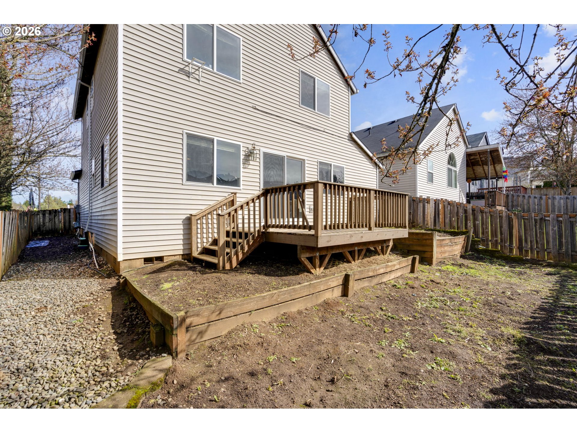 38882 Haskins Street Sandy, OR 97055 - Photo 43 of 46 a view of a house with wooden fence