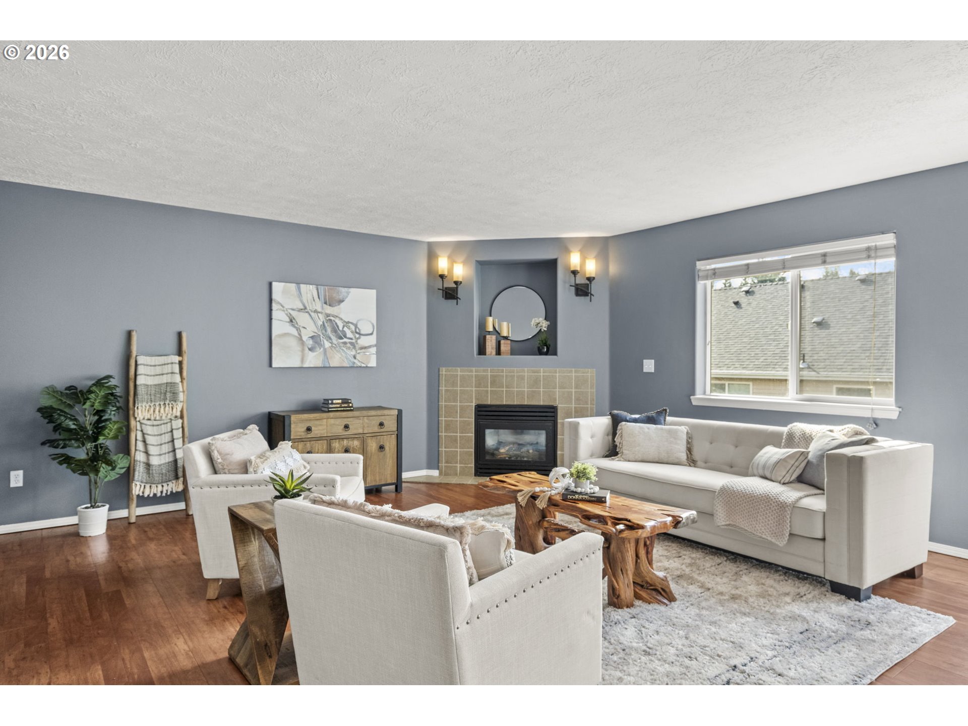 38882 Haskins Street Sandy, OR 97055 - Photo 8 of 46 a living room with furniture and a fireplace