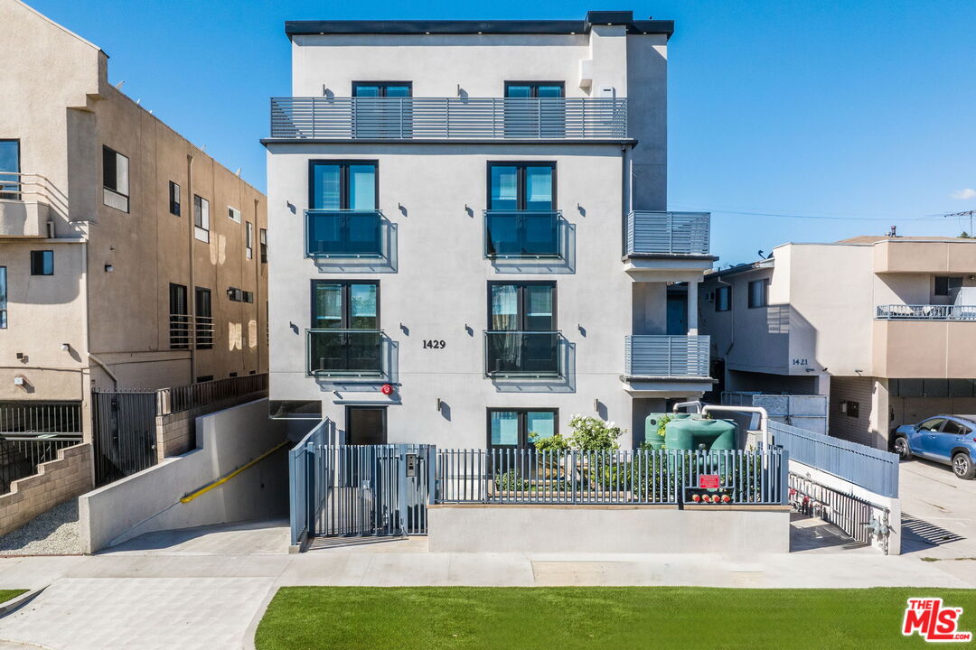 a view of multiple house with a swimming pool