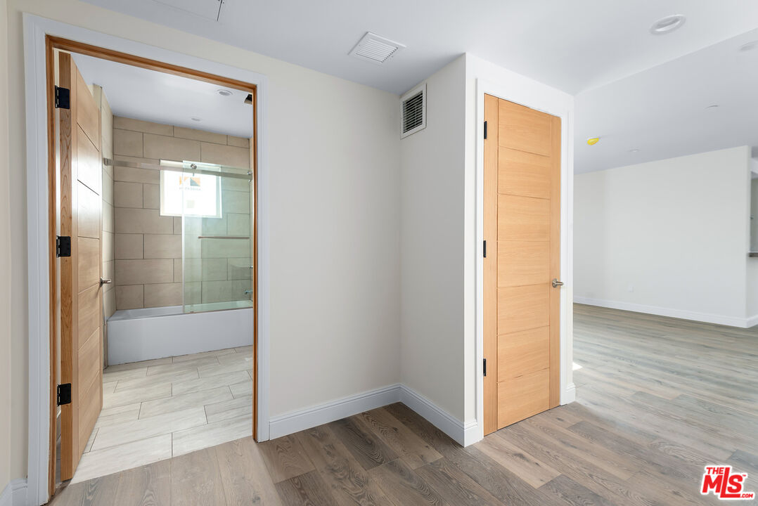 1429 South Bedford Street, Unit 201 Los Angeles, CA 90035 - Photo 5 of 12 wooden floor in a room