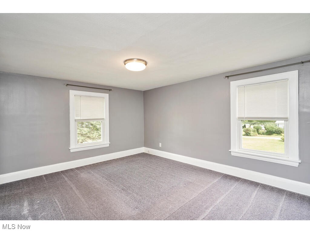 3468 Copley Road Akron, OH 44321 - Photo 13 of 22 Spare room with carpet flooring