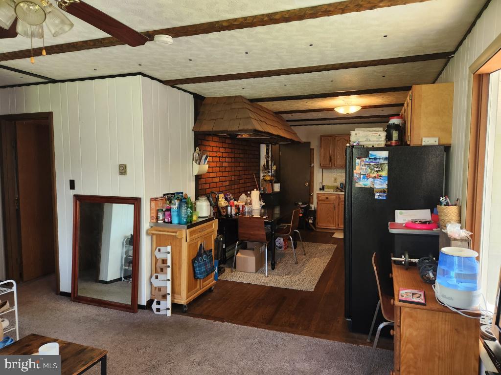 1692 Gish Road Manheim, PA 17545 - Photo 21 of 35 a living room with lots of furniture and gym equipment