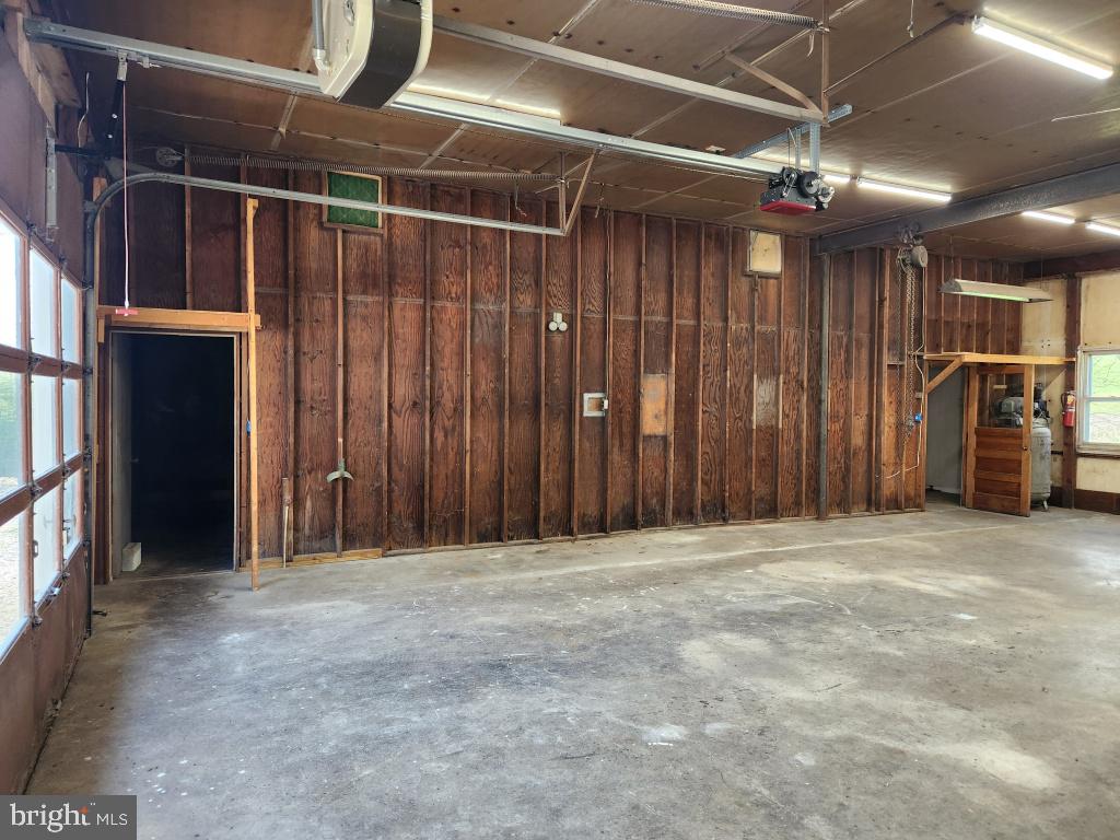 1692 Gish Road Manheim, PA 17545 - Photo 33 of 35 a view of an empty room with wooden walls
