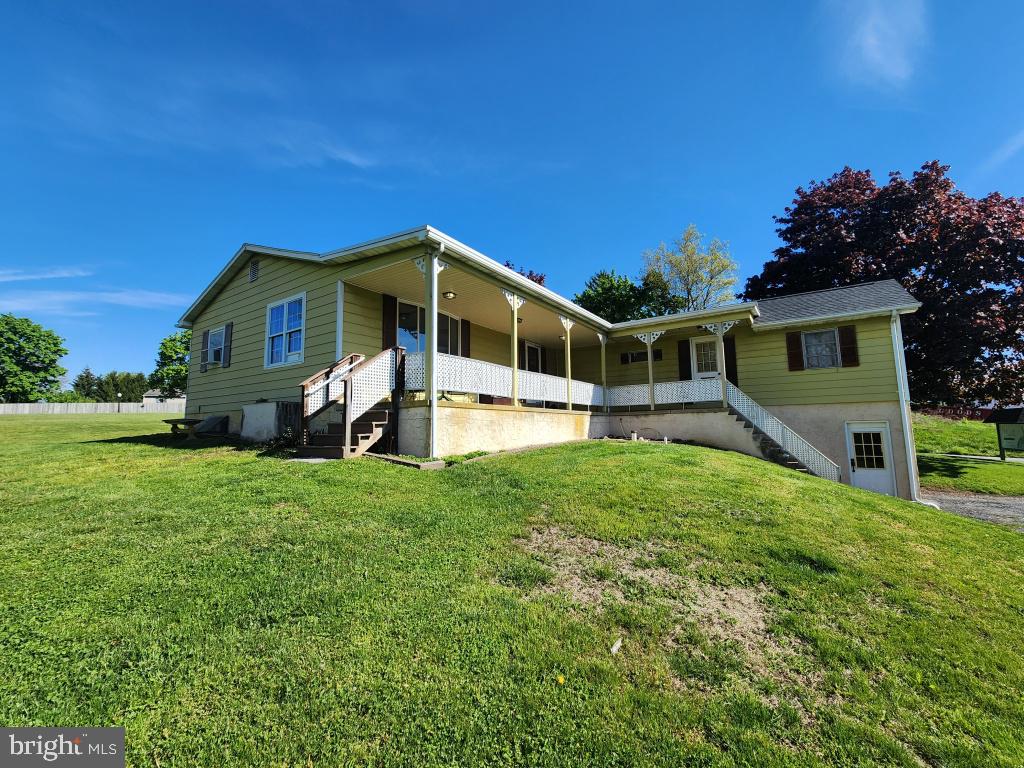 1692 Gish Road Manheim, PA 17545 - Photo 6 of 35 a front view of a house with a yard