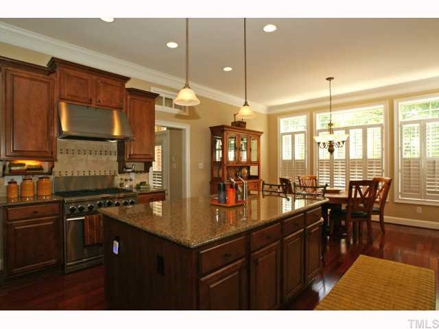 3921 Sunridge Road Raleigh, NC 27613 - Photo 4 of 12 a kitchen with lots of counter top space