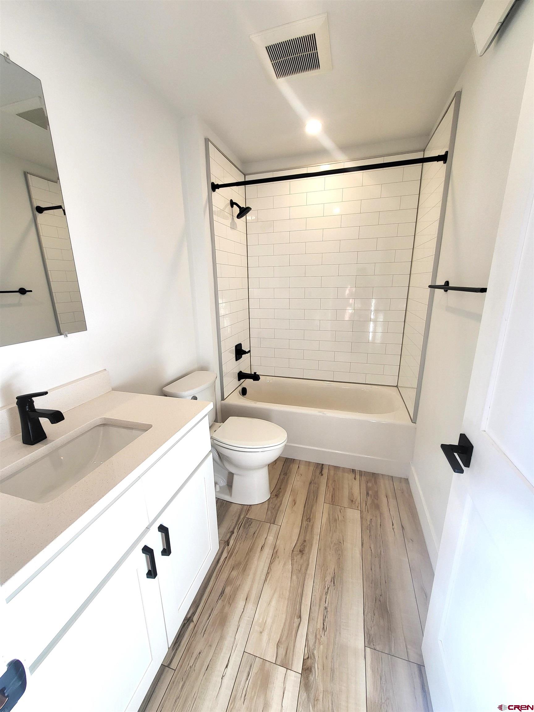 268 County Road Aa42 Frontage Road Norwood, CO 81423 - Photo 16 of 19 a bathroom with a sink a toilet a mirror and shower