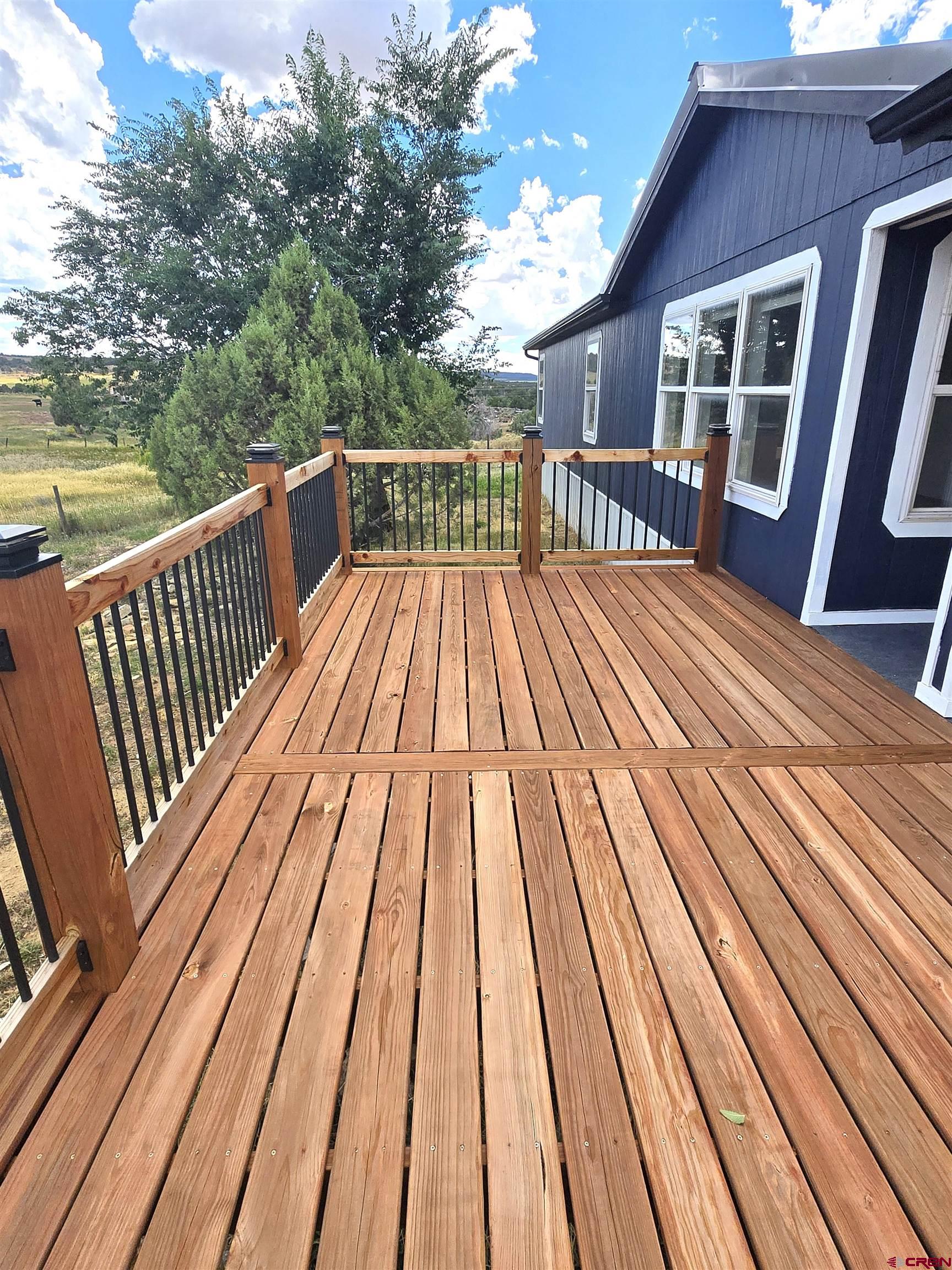 268 County Road Aa42 Frontage Road Norwood, CO 81423 - Photo 17 of 19 a view of wooden deck