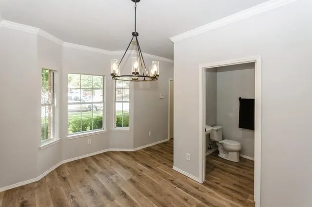 a view of livingroom with furniture and wooden floor