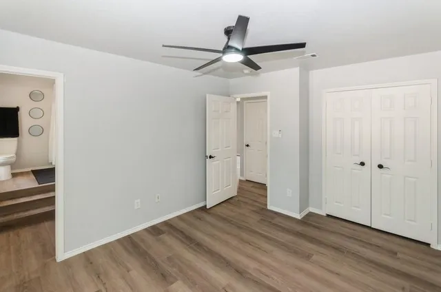 a view of a livingroom with wooden floor