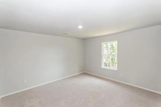 an empty room with a window
