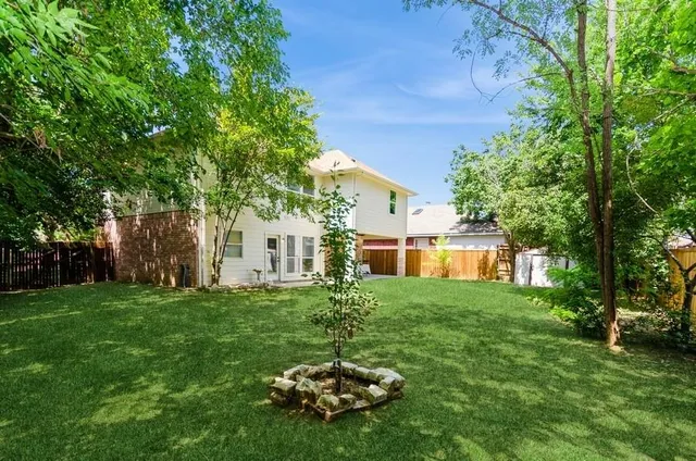 a house view with a garden space