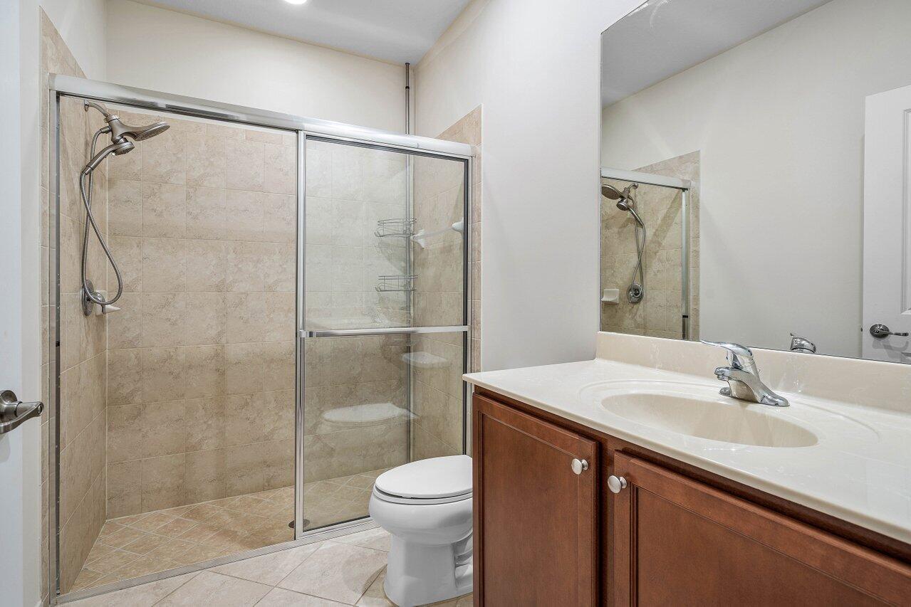 48 Northwest Hawthorne Place Boca Raton, FL 33432 - Photo 29 of 35 Guest Bathroom with Walk-In Shower