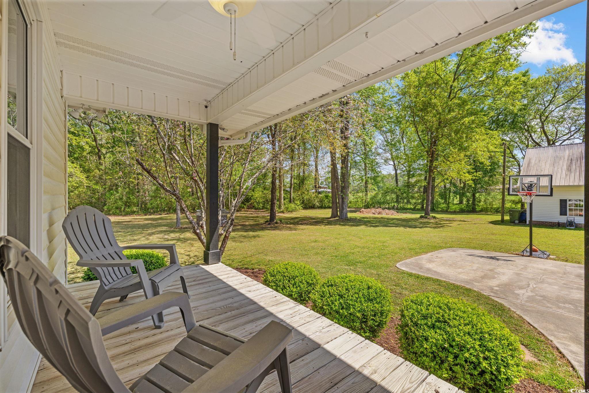 2731 Fork Of Swamp Road Galivants Ferry, SC 29544 - Photo 27 of 32 Side covered porch