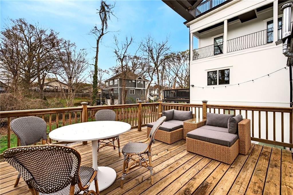 1036 Wylie Street Southeast Atlanta, GA 30316 - Photo 11 of 31 a balcony with table and chairs