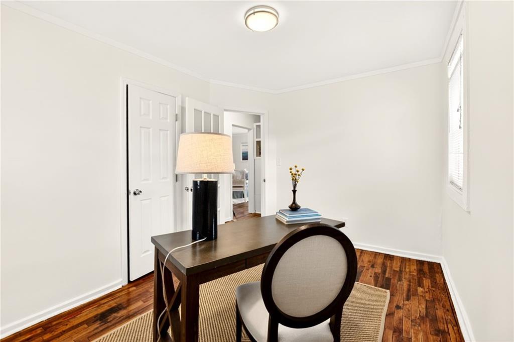 1036 Wylie Street Southeast Atlanta, GA 30316 - Photo 17 of 31 a view of a workspace with furniture and wooden floor