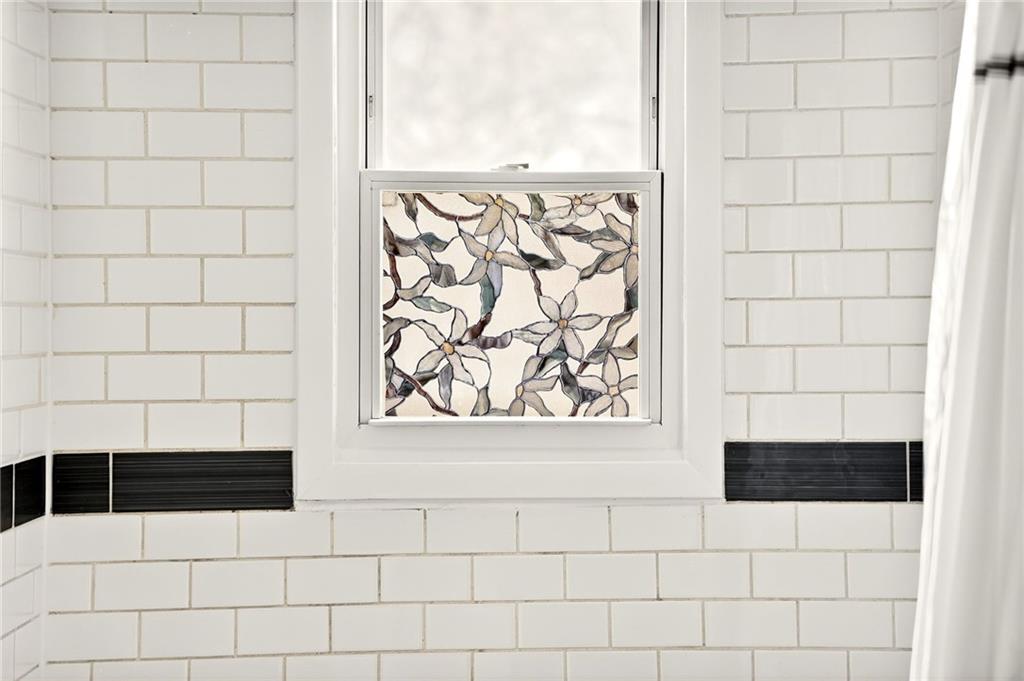 1036 Wylie Street Southeast Atlanta, GA 30316 - Photo 20 of 31 a bathroom with a shower