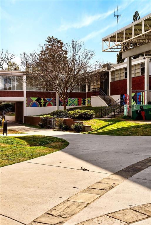 1036 Wylie Street Southeast Atlanta, GA 30316 - Photo 27 of 31 a view of a swimming pool with a patio and a yard with plants