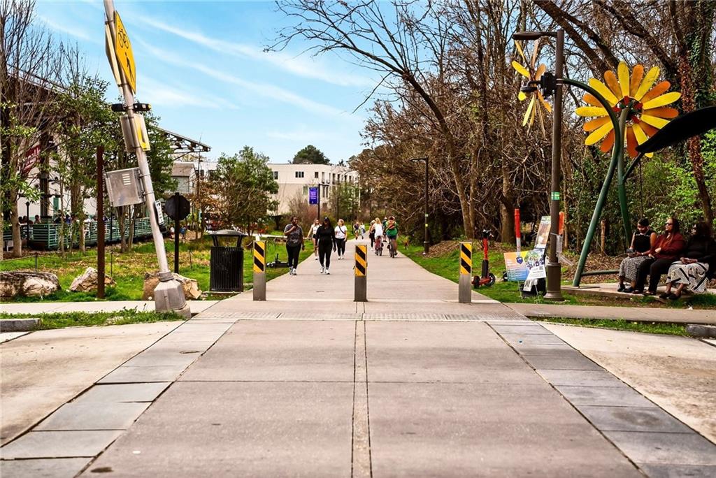1036 Wylie Street Southeast Atlanta, GA 30316 - Photo 3 of 31 a view of a park with swings and slides