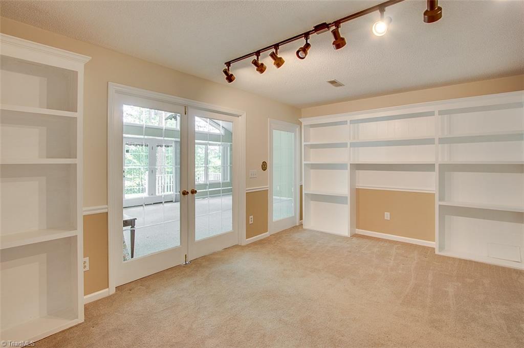 4633 Peace Road Trinity, NC 27370 - Photo 23 of 28 Your Very Own Library or Custom Playroom With Massive Custom Built Shelves