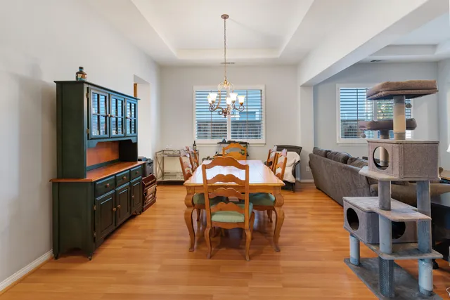 a living room with fireplace furniture and a flat screen tv