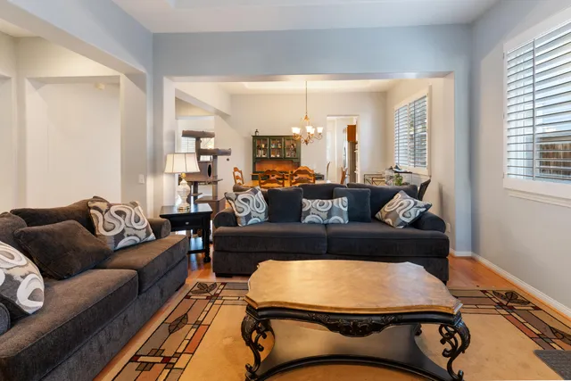 a living room with furniture and a couch