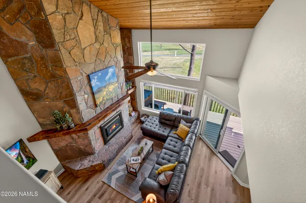 a view of living room and furniture