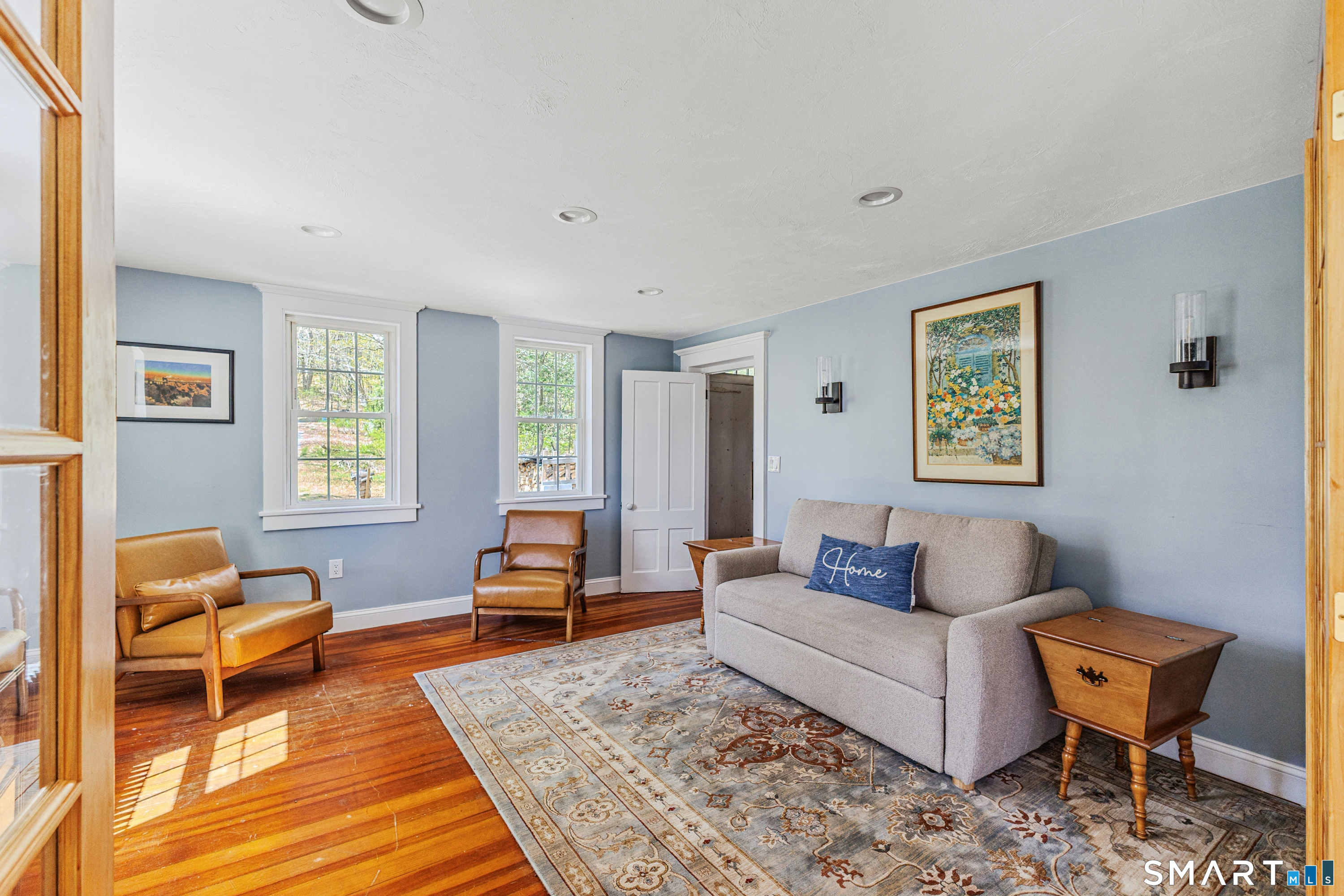 760 Upper Maple Street Killingly, CT 06239 - Photo 13 of 34 a living room with furniture and a wooden floor