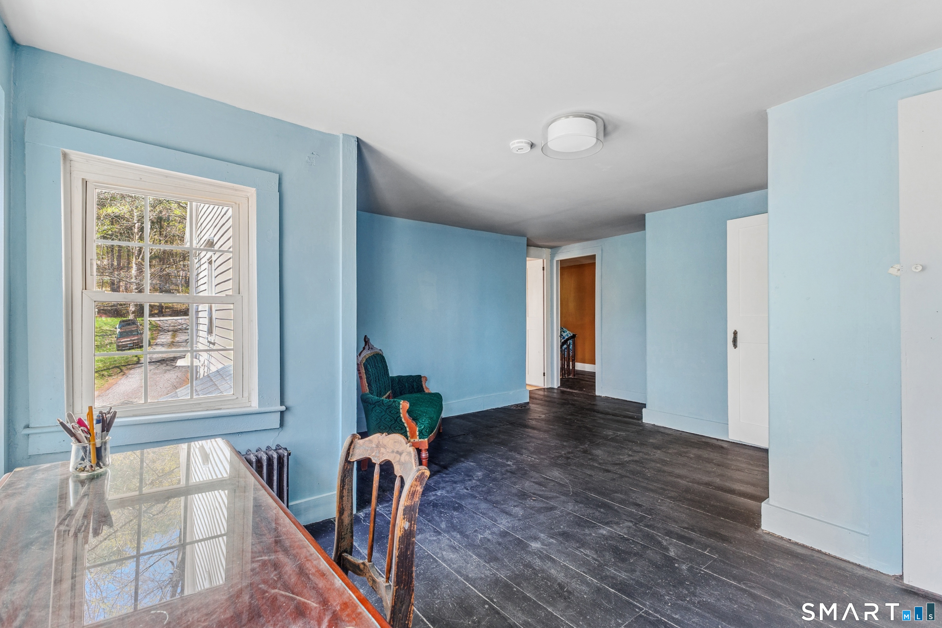 760 Upper Maple Street Killingly, CT 06239 - Photo 27 of 34 a view of an empty room with glass door and furniture