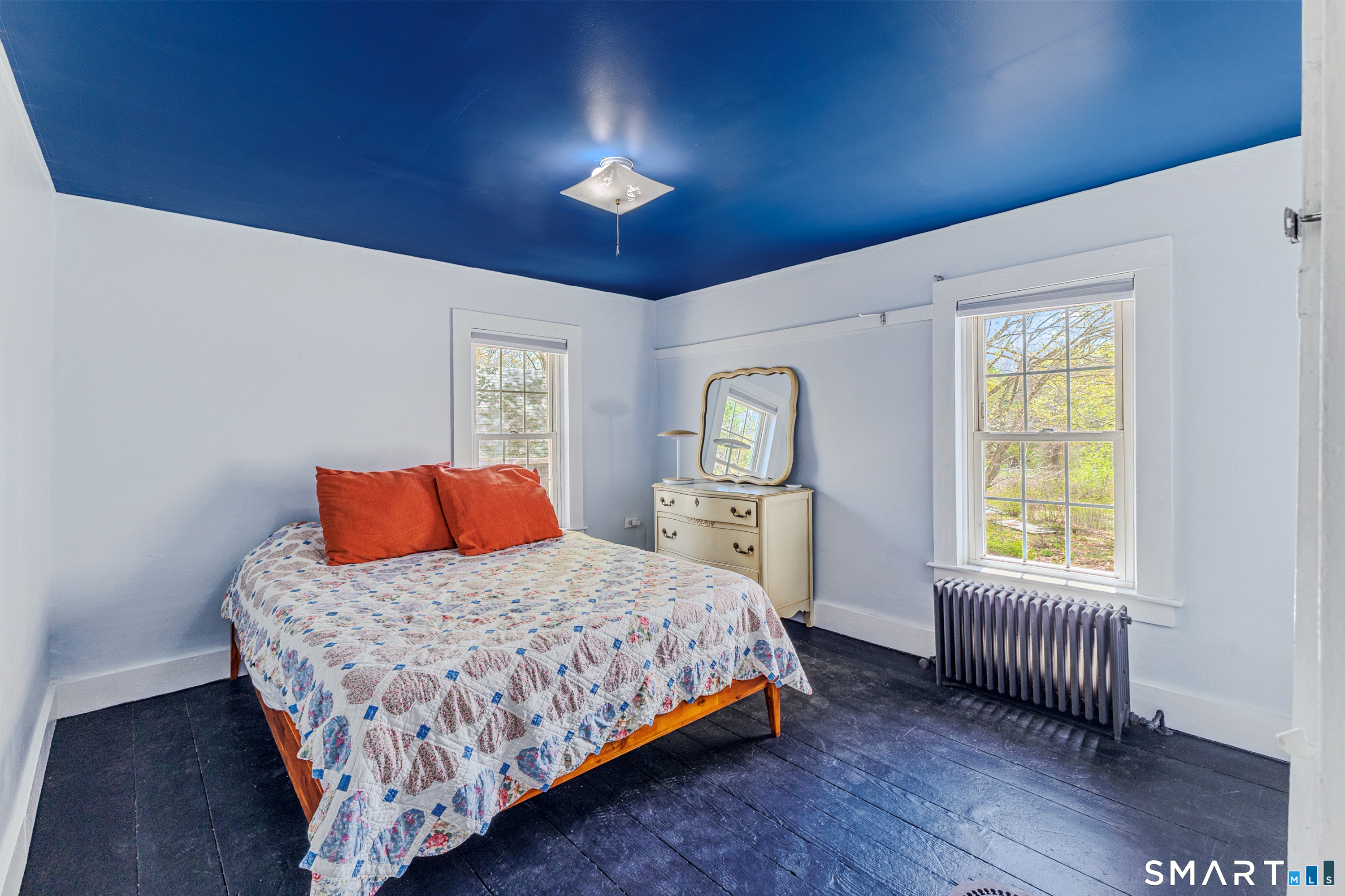 760 Upper Maple Street Killingly, CT 06239 - Photo 28 of 34 a bedroom with a bed and a chair