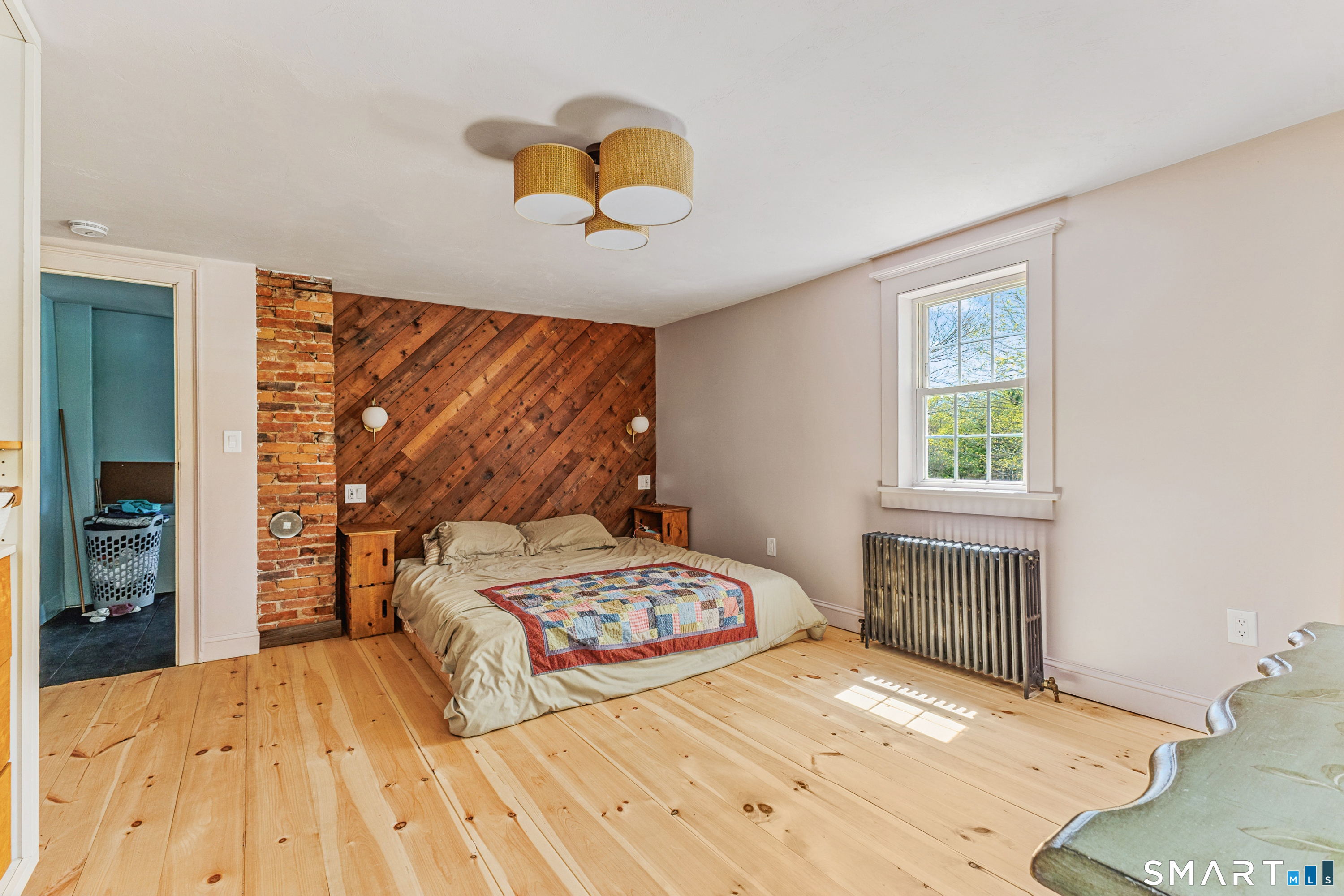 760 Upper Maple Street Killingly, CT 06239 - Photo 32 of 34 a bedroom with a bed and a window