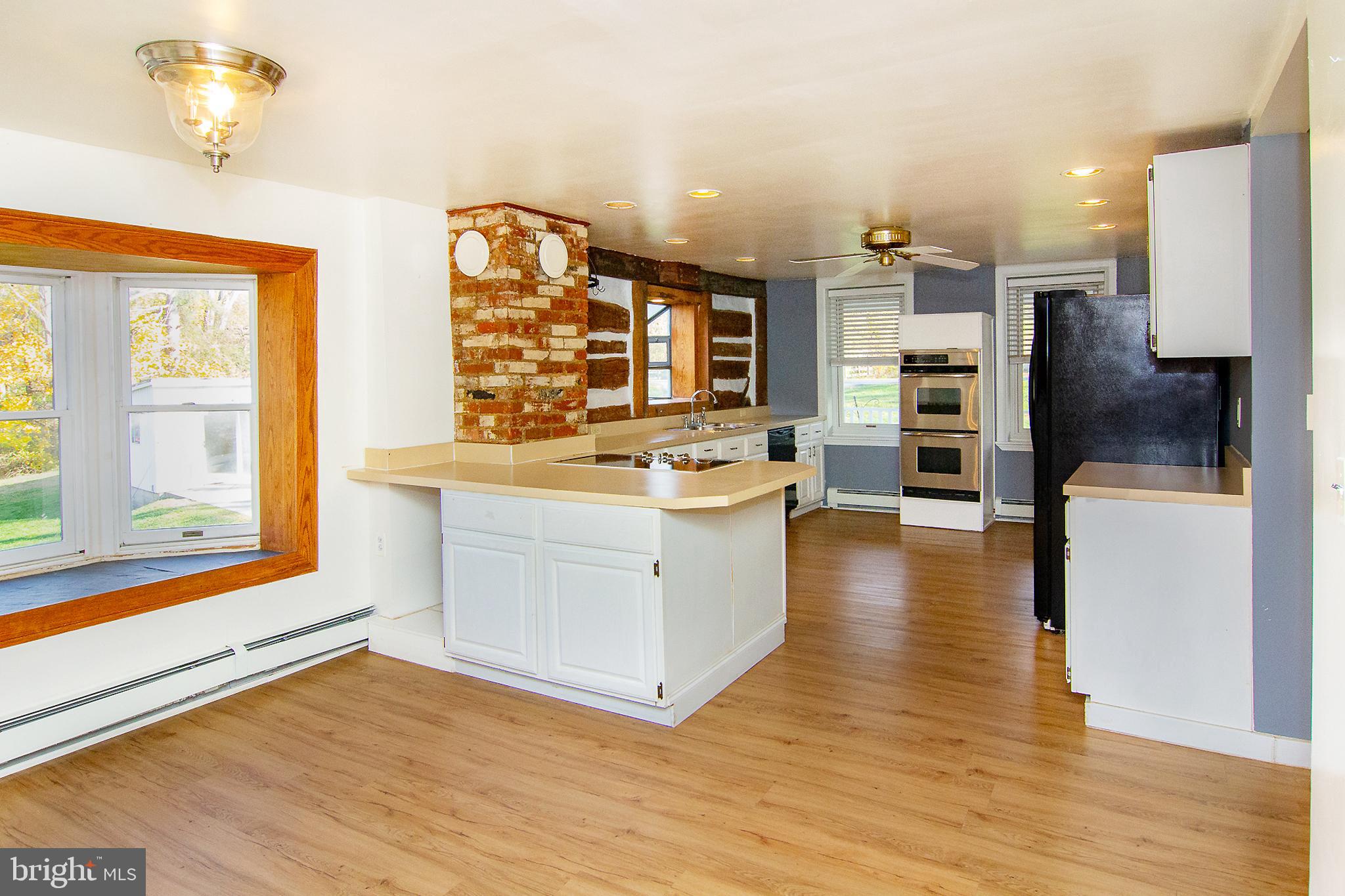 400 Leppo Road Westminster, MD 21158 - Photo 13 of 59 a view of living room with furniture and flat screen tv
