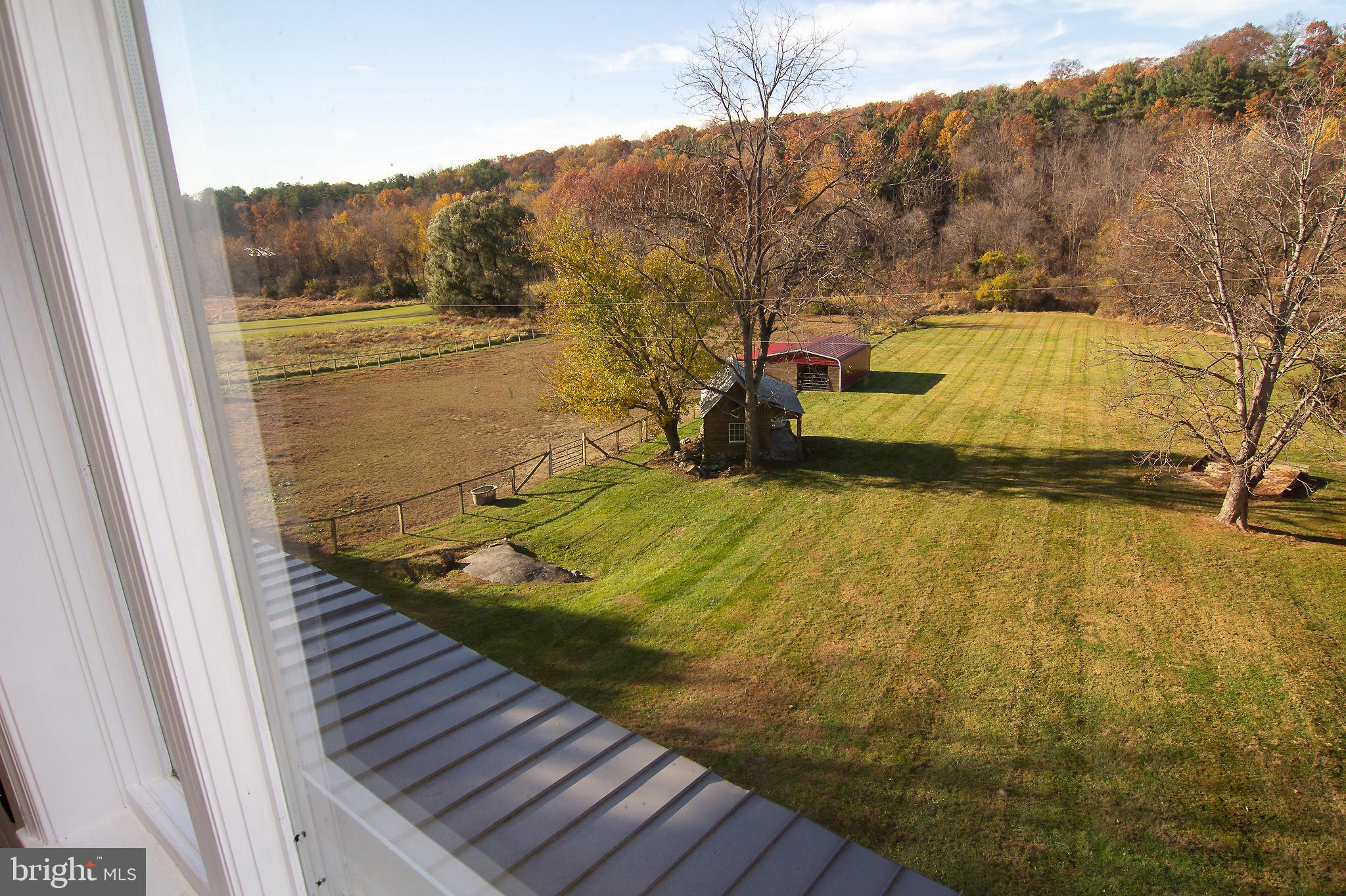 400 Leppo Road Westminster, MD 21158 - Photo 29 of 59 a view of a swimming pool with a yard