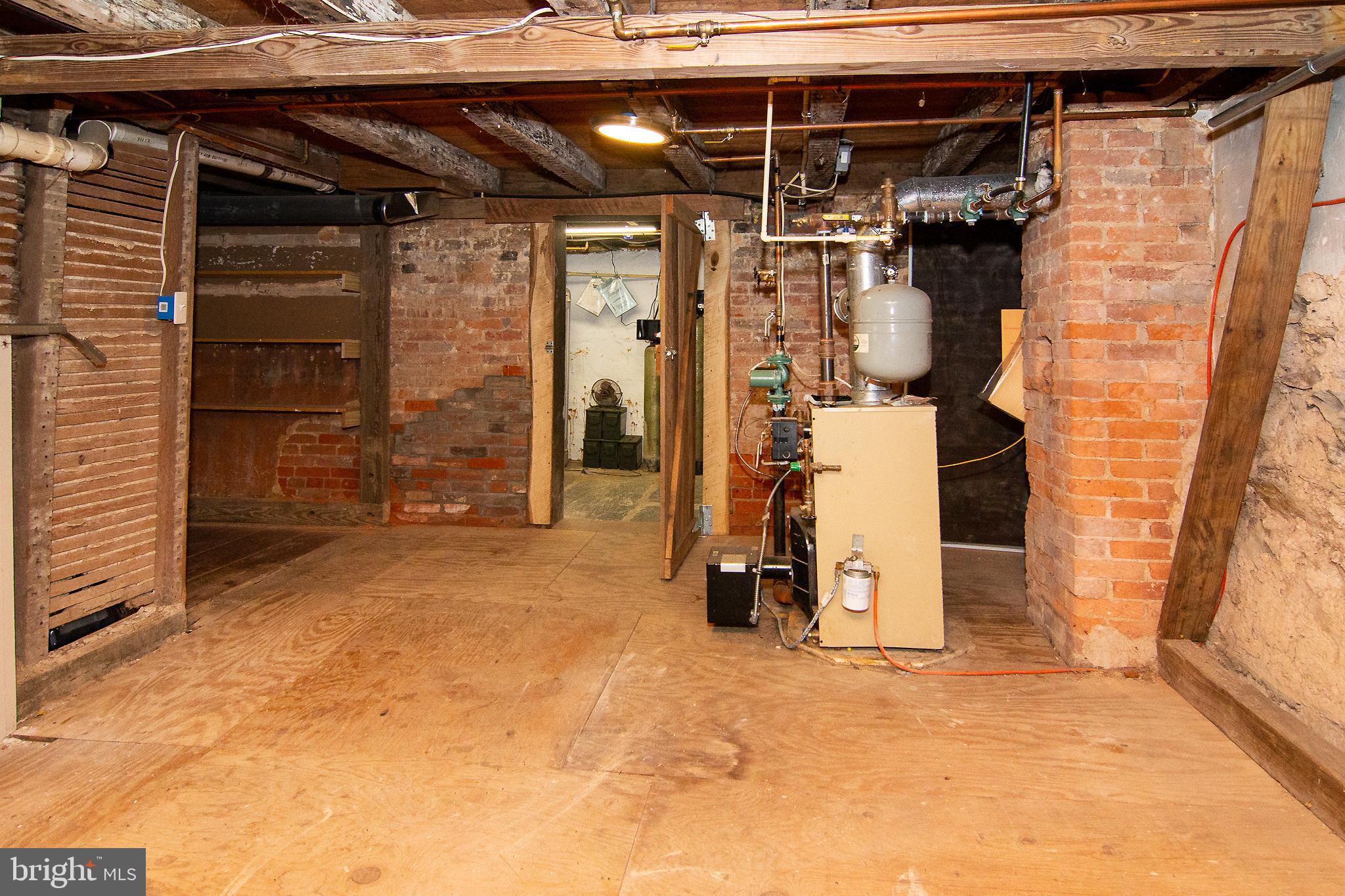 400 Leppo Road Westminster, MD 21158 - Photo 36 of 59 a view of walk in closet with clothes and shoes