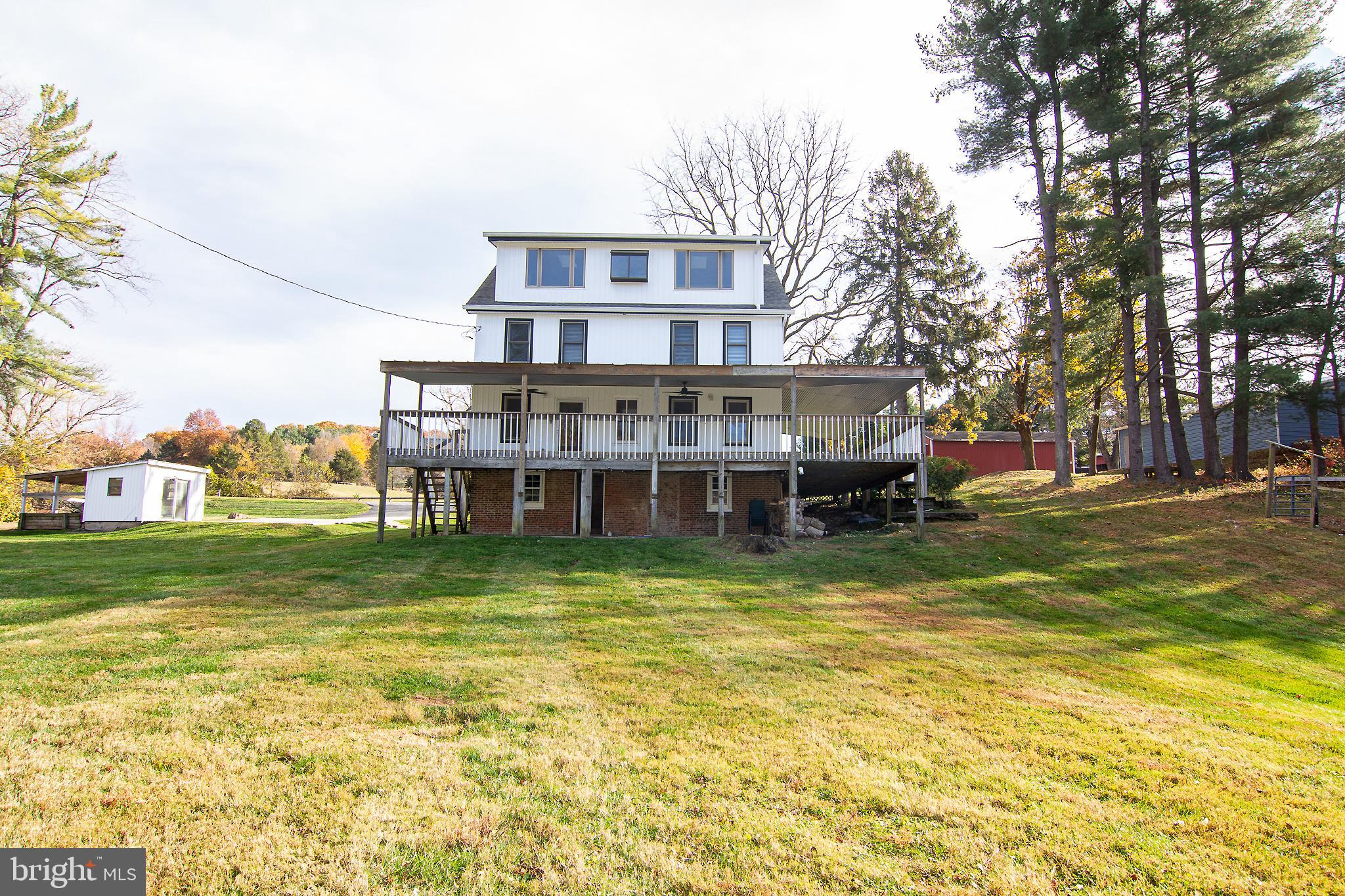 400 Leppo Road Westminster, MD 21158 - Photo 39 of 59 a view of a house with a yard